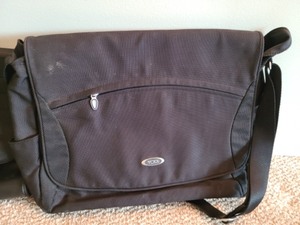 lot 111 image: Three Tumi Bags