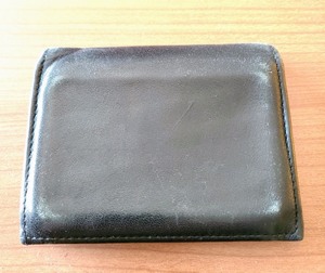 lot 239 image: Tumi Leather Wallet