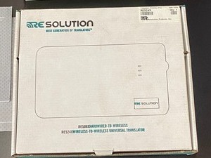 lot 32 image: Motorola Cordless Phone System, 8-Port Switch, Universal Translator