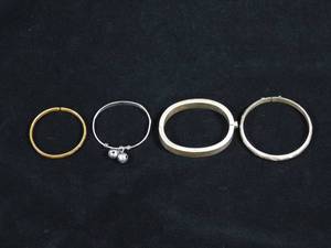 lot 72 image: 4 Bangle Bracelets - Over 60 Grams of Silver