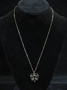 lot 39 image: Ornate Sterling Silver Heart Pendant with Birds and Red Stone on Chain