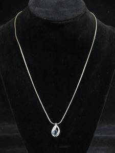 lot 45 image: Sterling Silver Chain with Blue Topaz Pendant