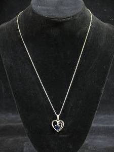lot 47 image: Sterling Silver Heart Pendant with Lab Created Sapphire Stone on a Chain