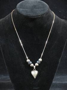 lot 49 image: Taxco Mexican Artisan Sterling Silver Heart Pendant on Serpentine Chain