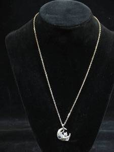 lot 50 image: UMA Sterling Silver Cat on the Moon Pendant with Chain