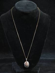 lot 58 image: Toned Sterling Silver Locket on Chain