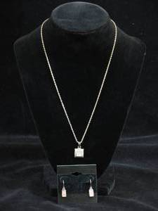 lot 61 image: Sterling Silver Chain, Earrings, and Pendant
