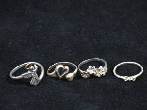 lot 32 image: 4 Ladies Silver Tone Rings - 2 Are Sterling