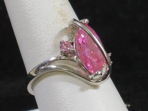 lot 22 image: Ladies Pink Topaz Silver Tone Ring