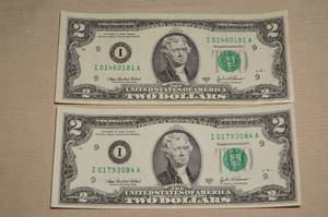 lot 49 image: (2) US 2 Dollar Bills