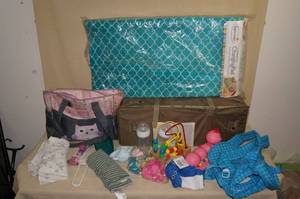 lot 83 image: Pack N Play, Diaper Bag and a Changing Pad