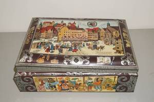 lot 128 image: Schmidt Beer Tin with Vintage Doll