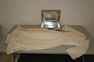 lot 133 image: Metal Tin with Vintage Dress