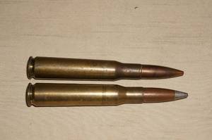 lot 133 image: (2) .50 BMG Rounds