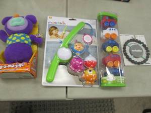 lot 74 image: 4 Assorted Toys...