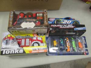 lot 77 image: 4 Assorted Toys...