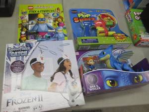 lot 105 image: 4 Assorted Toys...