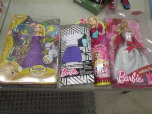 lot 117 image: Holiday Barbie, Tangled Doll, Princ...