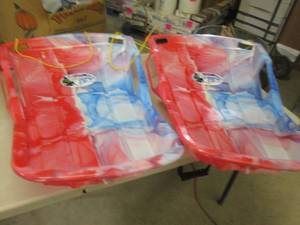 lot 148 image: 2 Snow Sprint Molded Sleds...