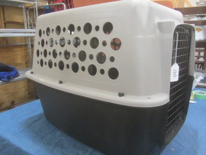 lot 110 image: Plastic Kennel