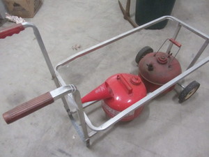 lot 121 image: Gas Cans, Garbage Caddy