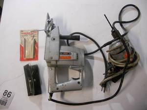 lot 86 image: Black and Decker Drill, Skil Saber Saw Model 577 and Saber Saw Blades