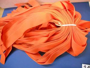lot 146 image: Lot Orange Strapping 55-60 pieces, approx 56 long