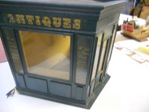 lot 101 image: Antique Store Display Unit - Fun to fill with Minitures Top, Back, and Front Door open to decorate Super Fun and Cute Corner needs to be repaired - See Pic