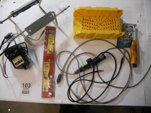 lot 103 image: 48 Lawnmower blade, Miter saw holder, Stapler, Staples, Borescope, Etc
