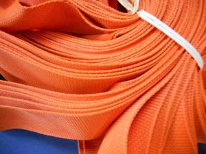 lot 179 image: Lot Orange Strapping 55-60 pieces, approx 56 long