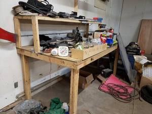 lot 197 image: Wood Work Bench - 96 long, 48 deep, 42 high plus 20 at shelf. Contents not included.