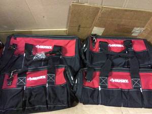 18 in. Wide Mouth Water Resistant Metal Hardware Dual-Zipper Tool Storage Bag with Shoulder Strap and 14 total pockets by Husky in good&nbsp condition