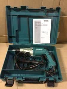 6.6 Amp 34 in. Corded Hammer Drill with Torque Limiter Side Handle Depth Gauge Chuck Key Hard Case by Makita in good&nbsp condition