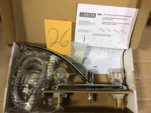 lot 26 image: Foundations 2-Handle Standard Kitchen Faucet in Chrome by Delta in good condition