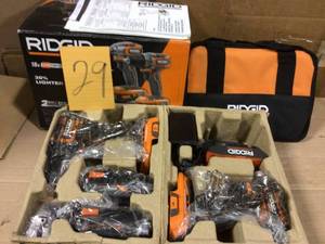 lot 29 image: 18V Brushless SubCompact Drill Driver and Impact Driver Combo Kit with (2) 2.0 Ah Batteries, Charger and Bag by RIDGID in good condition