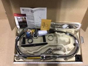 lot 40 image: Leland Single-Handle Pull-Down Sprayer Kitchen Faucet with ShieldSpray and MagnaTite Docking Technologies in Chrome by Delta in good condition