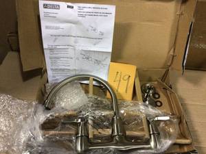 lot 49 image: Corin 2-Handle Wall-Mount Kitchen Faucet in Stainless by Delta in good condition