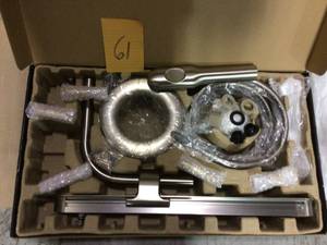 lot 61 image: Nebia by Moen 1-Spray 8 in. Dual Shower Head and Handheld Shower Head with Magnetic Dock in Spot Resist Brushed Nickel in good  condition