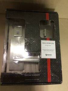 lot 77 image: Prestige Spyglass Satin Nickel Universal Entrance Door Handleset Featuring SmartKey Security by Baldwin in good  condition