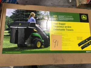 lot 91 image: John Deere BG20776 42 Twin Bagger for 100 Series Tractors in good  condition