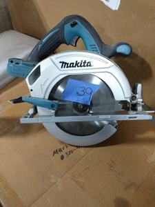 lot 39 image: MAKITA 18-Volt LXT Lithium-Ion Brushless Cordless 6-12 in. Circular Saw with Electric Brake and 24T Carbide Blade (Tool-Only)