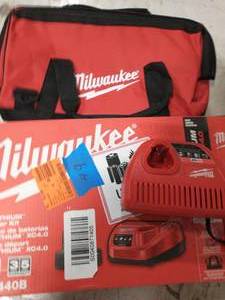 lot 49 image: MILWAUKEE M12 12-Volt Lithium-Ion 4.0 Ah Battery and Charger Starter Kit with Tool Bag