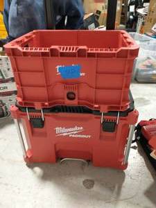 lot 48 image: MILWAUKEE PACKOUT 22 in. Rolling Tool Box AND PACKOUT 18.6 in. Tool Storage Crate Bin