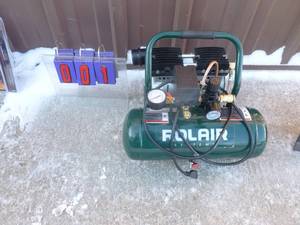 Rolair 2.3 gallon air compressor. Appears nearly new. Tested & works. As shown.