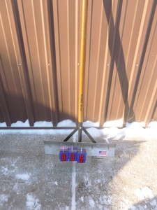 Aluminum snow shovel. As shown.