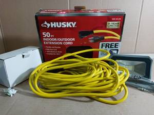 143 50 ft. Yellow Extenstion Cord with 1,000 Lumen Work Light by Husky - open box not used