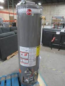 lot 15 image: RHEEM PROG29-32N RH63 Natural Gas Residential Gas Water Heater, 29 gal., 32,000 BtuH, PROG29-32N RH63. - Dented Housing.