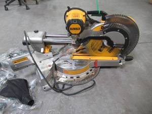 lot 57 image: DEWALT 15 Amp 12 in. Sliding Compound Miter Saw DWS779