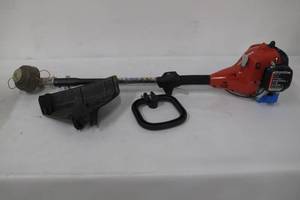 lot 13 image: Homelite 2-Cycle 26 CC Straight Shaft Gas Trimmer