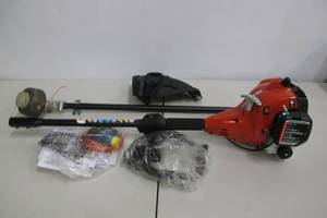 lot 53 image: Homelite-2-Cycle 26 CC Straight Shaft Gas Trimmer.